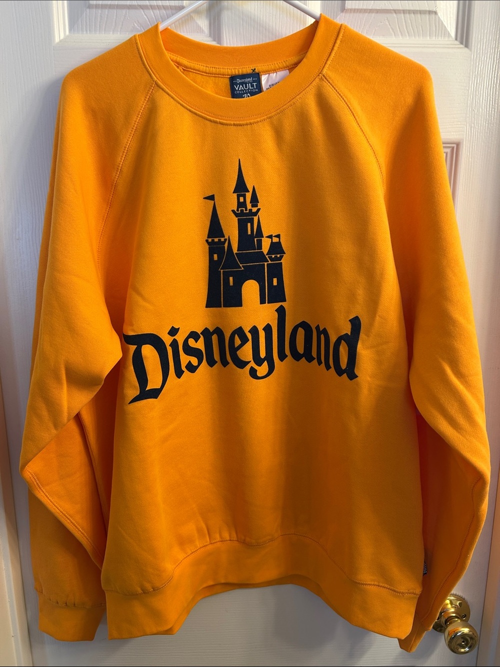 NWT DISNEYLAND orange sweatshirt